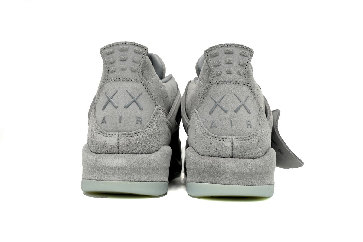 Stylish KAWS x Air Jordan 4 Retro in Sleek Grey