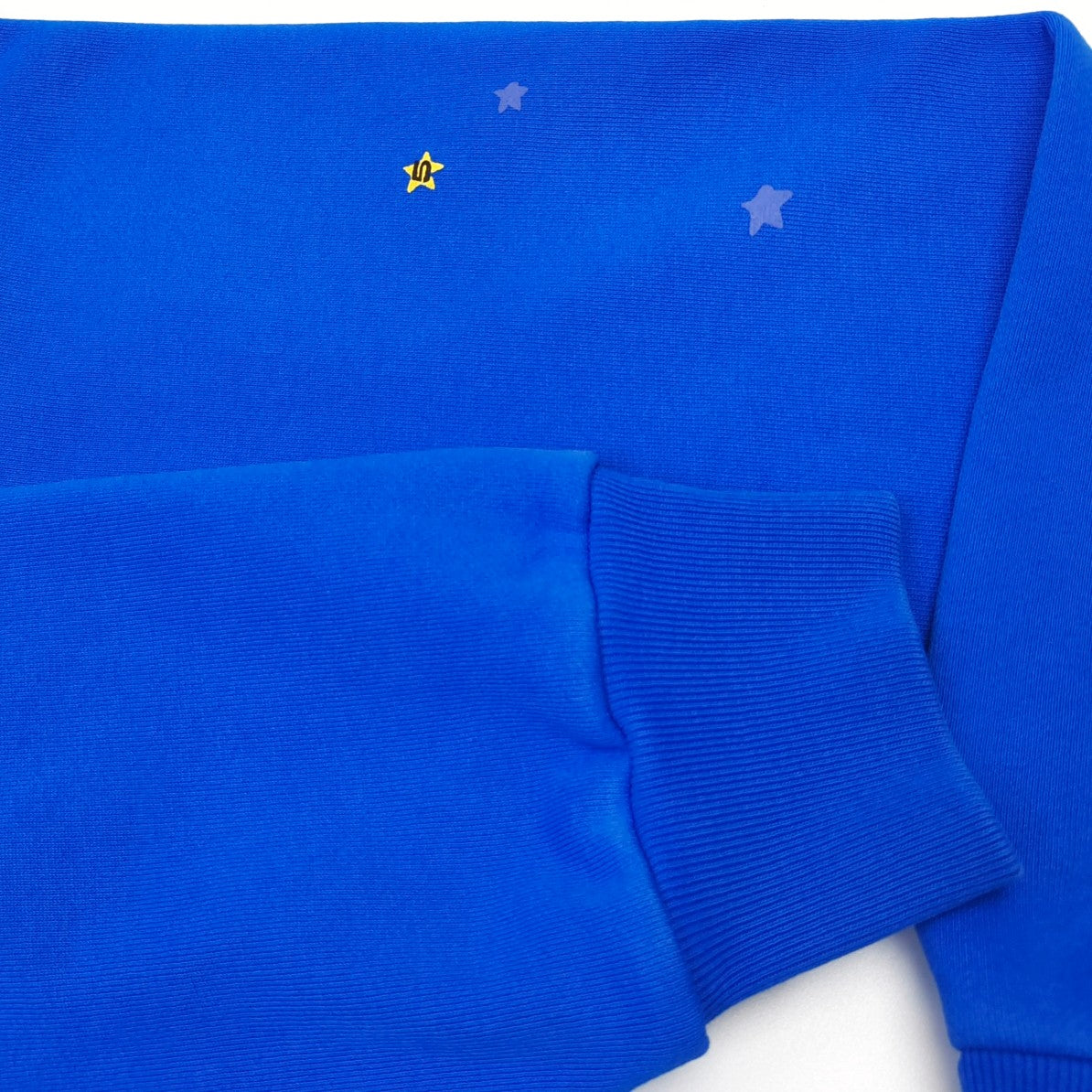 Elevate Your Style with the Sp5der Blue TC Hoodie!