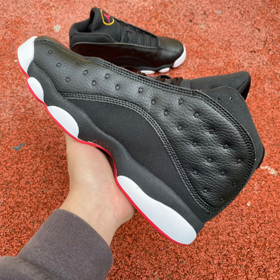 Sleek Black and White Jordan 13 Sneakers