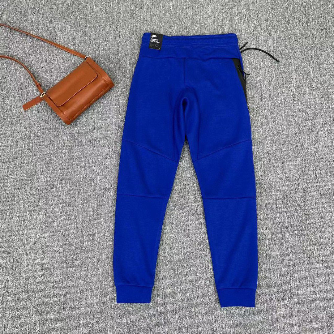 Elevate Your Style with NIKE Blue Tech Fleece Pants