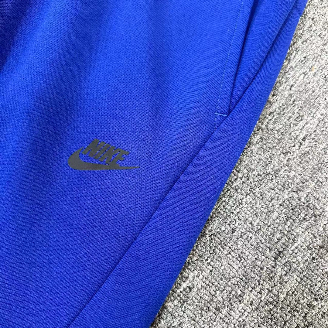 Elevate Your Style with NIKE Blue Tech Fleece Pants