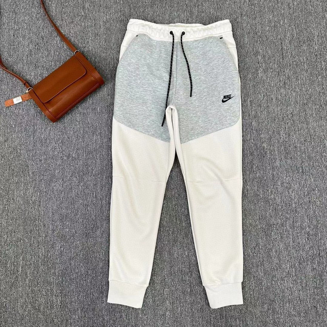 Elevate Your Style with Nike Tech Fleece Pants in Grey Volt