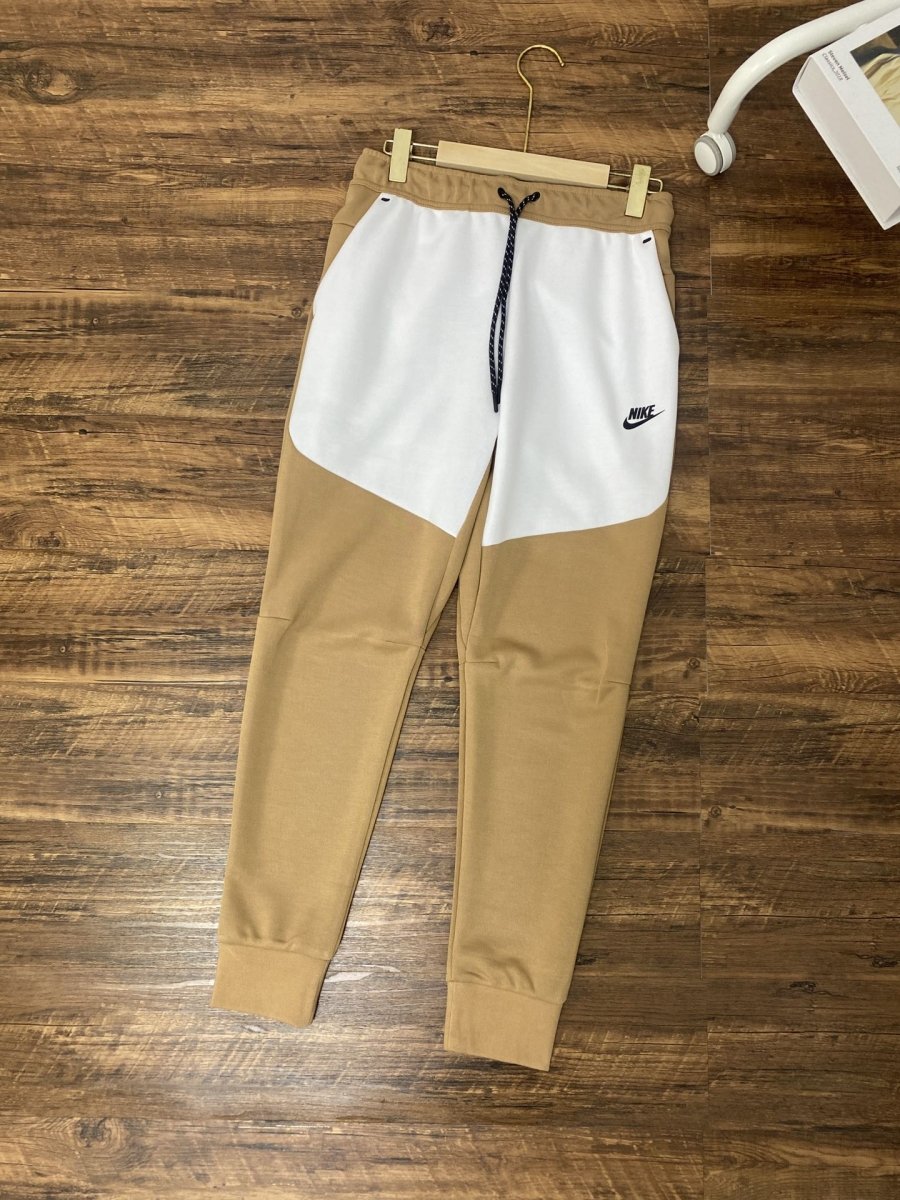 Elevate Your Style with Nike Tech Fleece Pants in Sandalwood, Light Bone, and Black