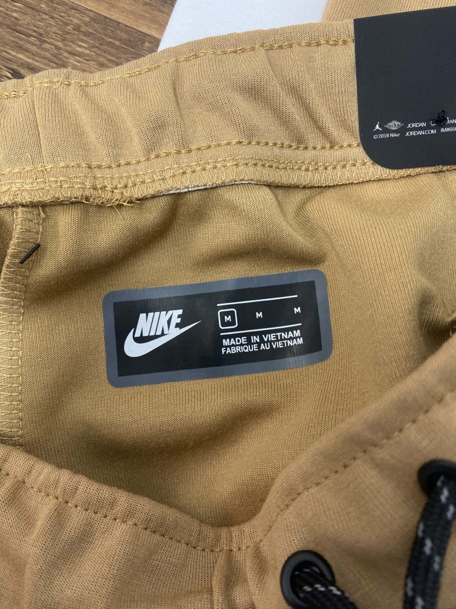 Elevate Your Style with Nike Tech Fleece Pants in Sandalwood, Light Bone, and Black